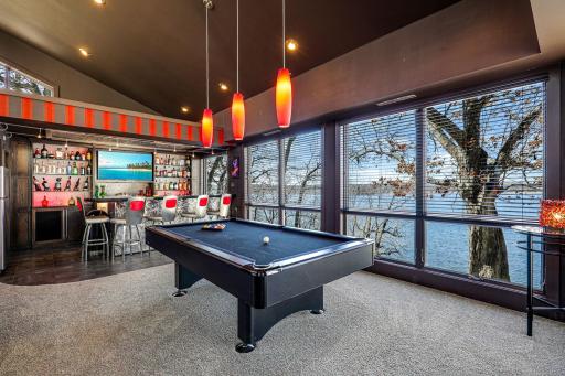 Enjoy the luxurious bar/entertainment area complete with a wine fridge, dishwasher, trash compacter and garbage disposal.