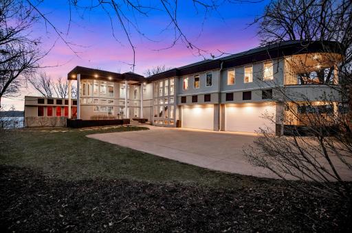 This is a rare opportunity to own a one-of-a-kind, 2015, Smuckler designed estate with expansive, sunset views, on the shores of Eagle Lake.