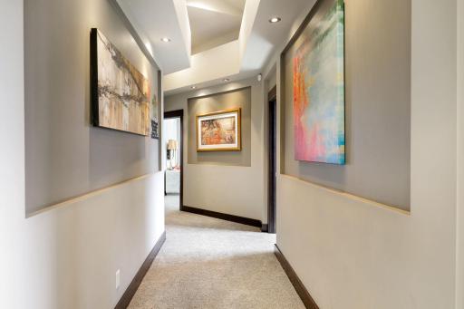 The hallways offer space and lighting for artwork throughout.