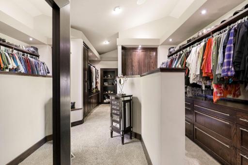 The massive walk-in closet provides abundant built-ins and hanging space.