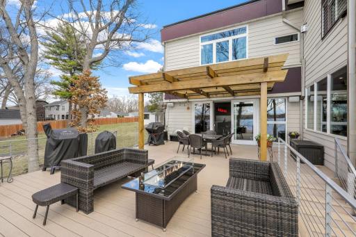 The massive 2-tiered deck provides a ton of space for entertaining with lake and sunset views.
