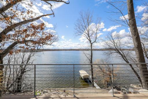 The massive 2-tiered deck provides a ton of space for entertaining with lake and sunset views.
