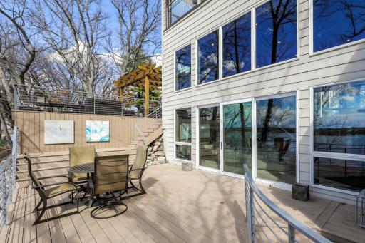 The massive 2-tiered deck provides a ton of space for entertaining with lake and sunset views.