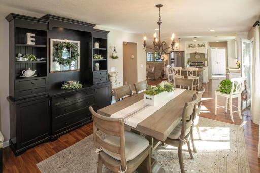 The spacious dining area has a wall of windows as well.