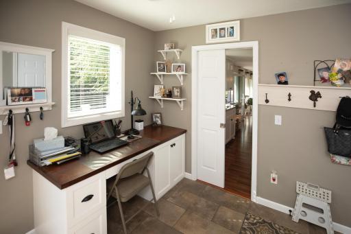 Great office space off the garage and kitchen. Who doesn't love a pocket door!