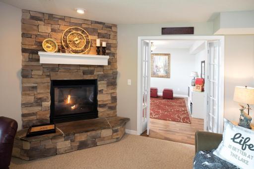 Fireplace is regulated by the thermostat on the wall.