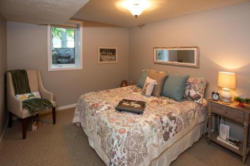 This is the 2nd bedroom on the lower level. Slight egress, with great yard views.