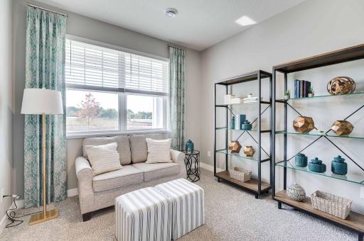 At the front of the home, this flex room provides you with options - office, den, exercise room...its all up to you! (Model home, colors will vary)