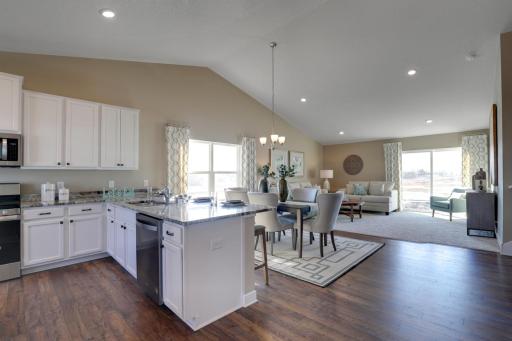 Natural light and open feel throughout the main floor. Model home shown.