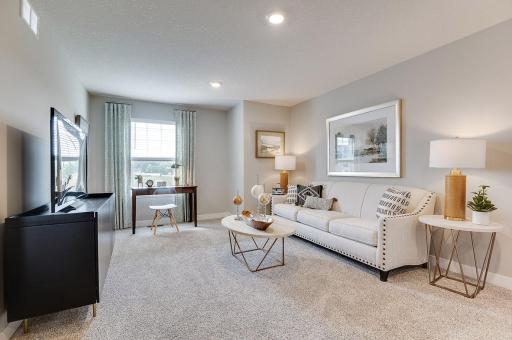 Located on the upper level, this perfectly sized living space has enough room for the entire family. Plus, it is just steps away from all four bedrooms. *pictures are of a model home, actual colors and finishes may vary.