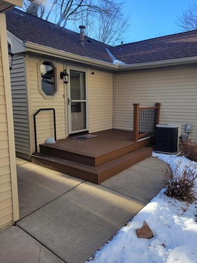 Trex deck off back door and concrete sidewalk