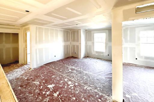 Pardon the mess! Home under construction. This home features an amazing loft space upstairs that is central to all the bedrooms. What an awesome area for relaxation. *Picture is of actual home.