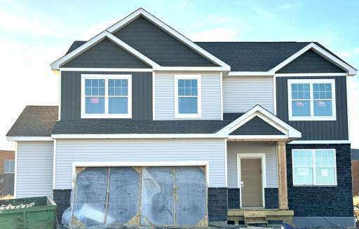 Pardon the mess! Home under construction. Take a look at this amazing Hudson plan that is available at 8077 Marquette Ave NE. *Picture is of actual home.