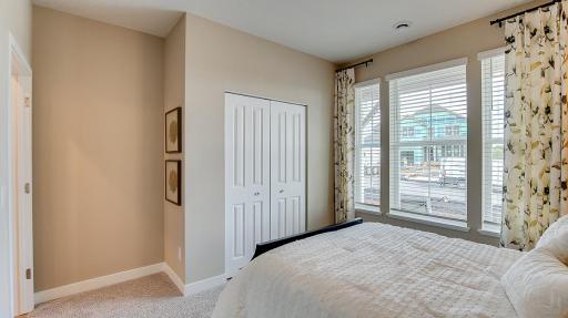 Another view of the front bedroom. Model photo. Options and colors will vary. See listing agent for home specific selections.