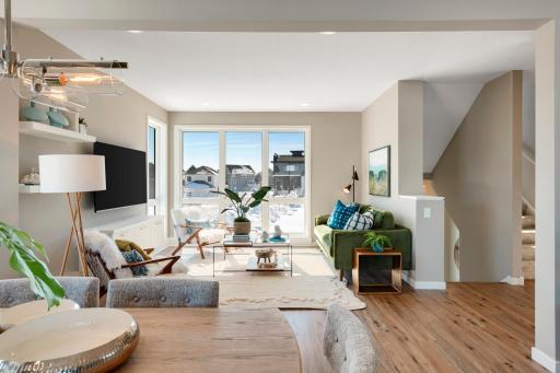 These award winning townhomes are unique and elegant from the curb appeal to the stunning interiors. Urban inspired interiors with luxury features. Photo is of similar floorplan; options and features will vary.