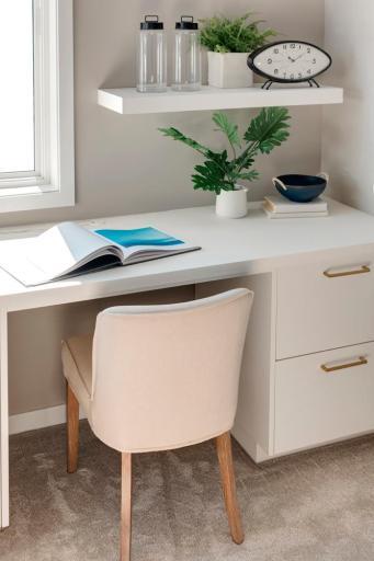 This built-in desk option is a favorite of everyone! Photo is of similar floorplan; options and features will vary.