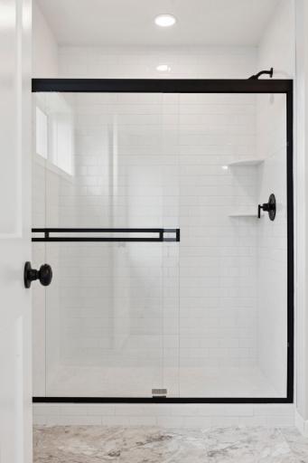 Tiled shower in owner's bath