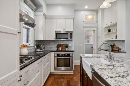 Custom Cabinetry offers plenty of storage space for cookware, utensils, and pantry essentials, keeping the kitchen organized and clutter-free.