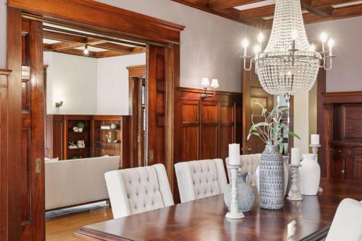 Beautifully restored paneled walls with original fixtures will take your breath away. Total privacy can be experienced in this dining space with original majestic wood paneled sliding doors separating living spaces