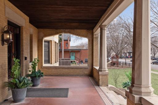 A magnificent front porch that adds functionality, and charm