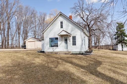 3 Bedroom 1 bath home on 6.88 acres just minutes from Madison Lake. Home features main floor laundry, oak floors, and an updated kitchen & bathroom. Outbuildings include a granary and barn. America's Preferred Home Warranty Included.