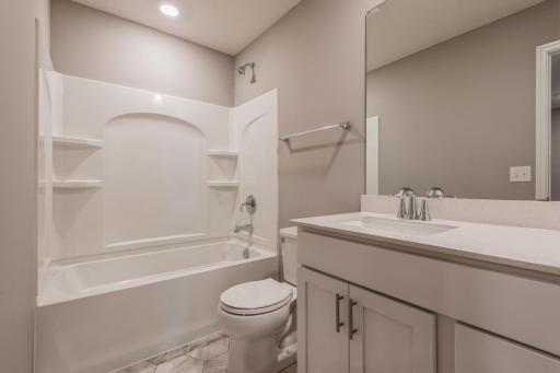 Photo for 10618 Weston Way N, Maple Grove, MN 55369 - Listing #6478866 The home's secondary bath features a vanity with extra space to help keep everyone moving during those busy mornings. *Photos are of another home, colors and finishes will vary.