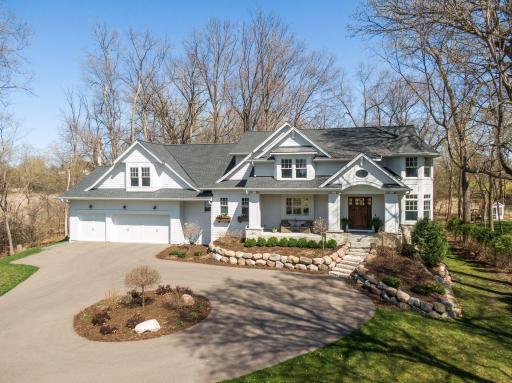 Circle driveway with beautiful landscaping