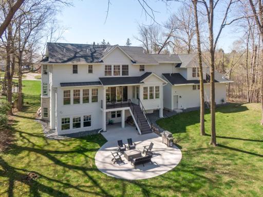 Amazing back yard with covered and four season porch. Room for a pool too!