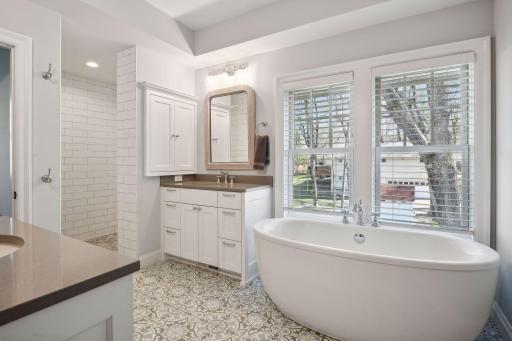 Master bath with soaking tub and walk in shower