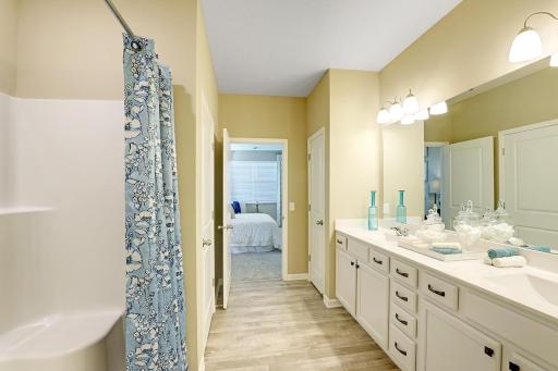 Photo for 12388 71st Street NE, Otsego, MN 55330 - Listing #6479199 Huge primary suite bathroom with double vanity sinks.