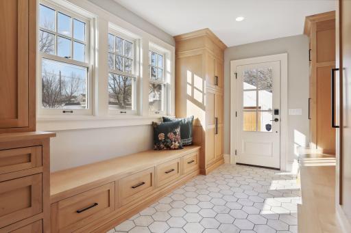 Completing the main floor is a mudroom with ample storage.