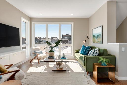 Urban inspired interiors with luxury features. Photo is of similar floorplan; options and features will vary.