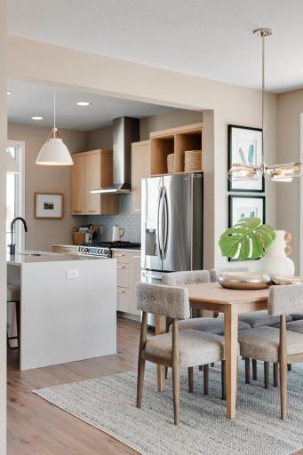 Urban inspired interiors with luxury features. Photo is of similar floorplan; options and features will vary.