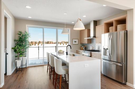 Urban inspired interiors with luxury features. Photo is of similar floorplan; options and features will vary.