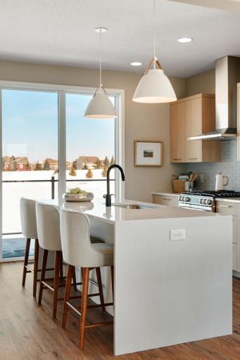 Urban inspired interiors with luxury features. Photo is of similar floorplan; options and features will vary.