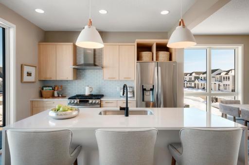 Urban inspired interiors with luxury features. Photo is of similar floorplan; options and features will vary.