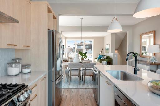 Urban inspired interiors with luxury features. Photo is of similar floorplan; options and features will vary.