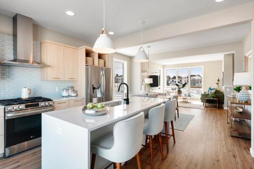 You will fall in love with the elevated and urban inspired interiors with luxury features so much that you will want to call this home! Photo is of similar floorplan; options and features will vary.