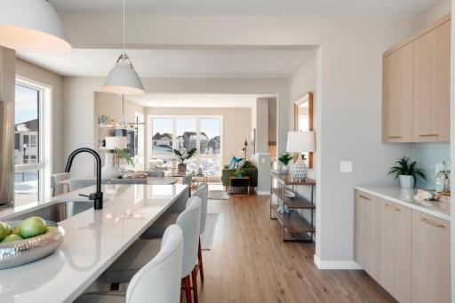 Urban inspired interiors with luxury features. Photo is of similar floorplan; options and features will vary.