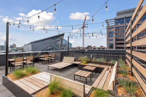 Shared Rooftop Deck with ample seating for entertaining.