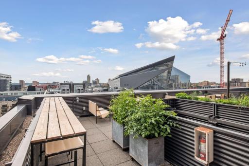 The shared rooftop deck offers panoramic views of the city!