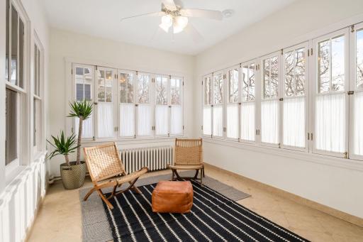 Heated sunroom with views of the Washburn Tower!