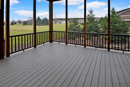 Screened porch constructed with maintanence free decking and railing.