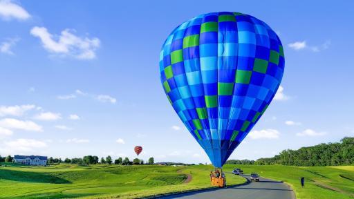 Frequent sightings of hot air balloons in Troy Burne Golf Village - 9th fairway