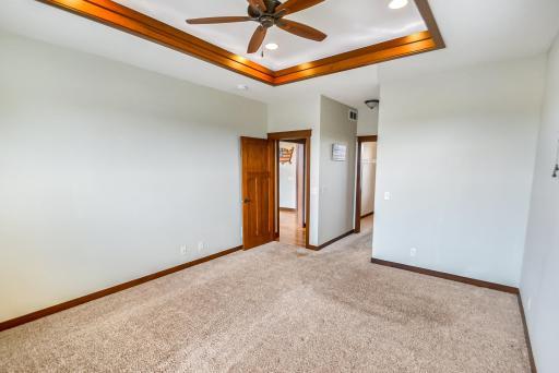 Owner's suite entry and access to private ensuite bath/closet.