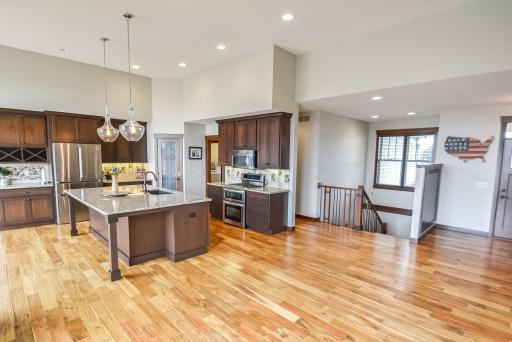 Wood floors throughout the main level living areas.