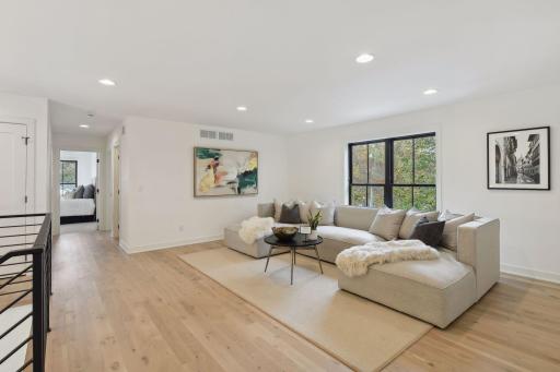 Loft Area Divides Primary Bedroom from other 3 Bedrooms