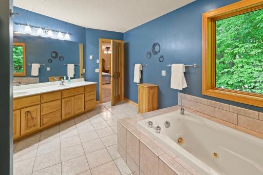 It offers a huge primary bath with large jetted tub, walk-in shower & large vanity with double sinks.