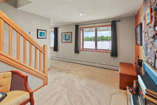 Lower level casual family room with wonderful views of the lake.