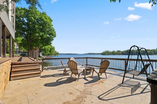 Super fun roof-top deck over the boat house offers awesome views. This home features many great entertaining areas.